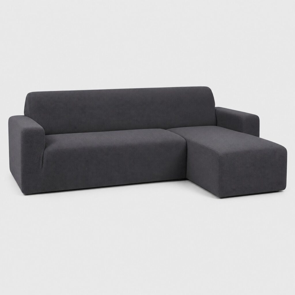 Housse de canapé d'angle en polyester gris anthracite présentée seule sur fond gris très clair