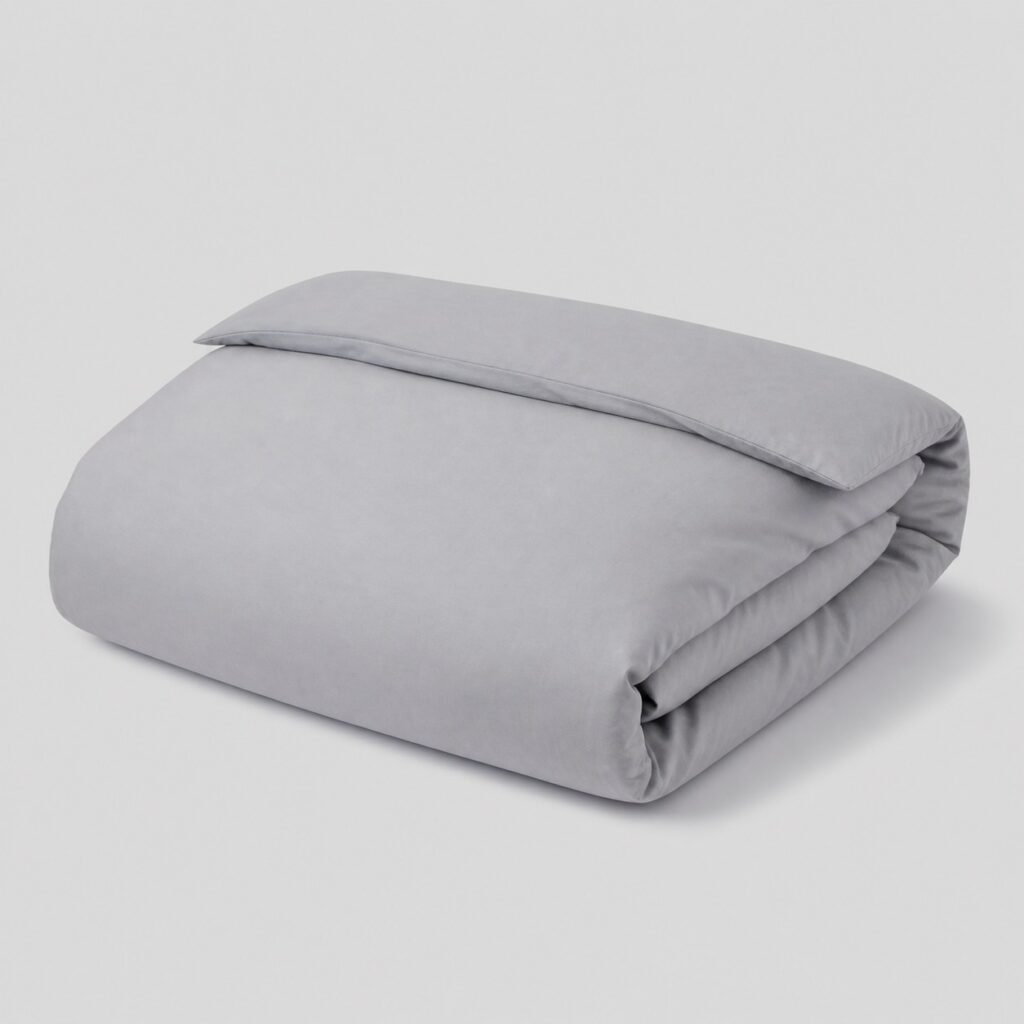 Housse de couette en coton gris clair uni sur fond gris très clair